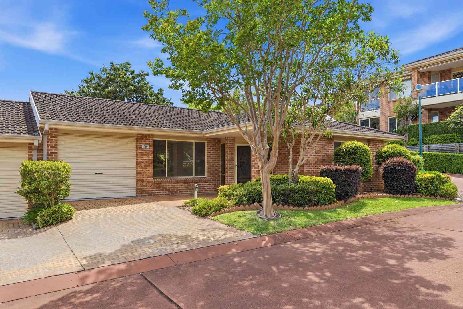 East facing rear aspect with enclosed sunroom and patio area for entertaining