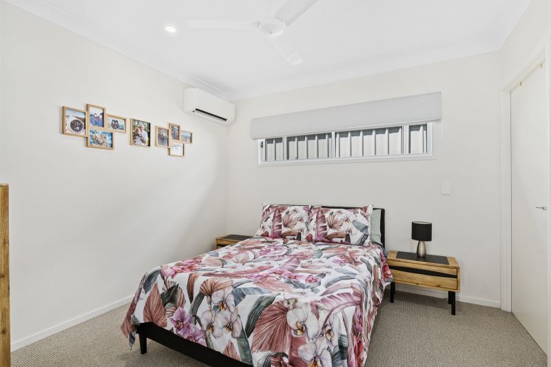 Elevated Home with Spacious Backyard and Modern Interior