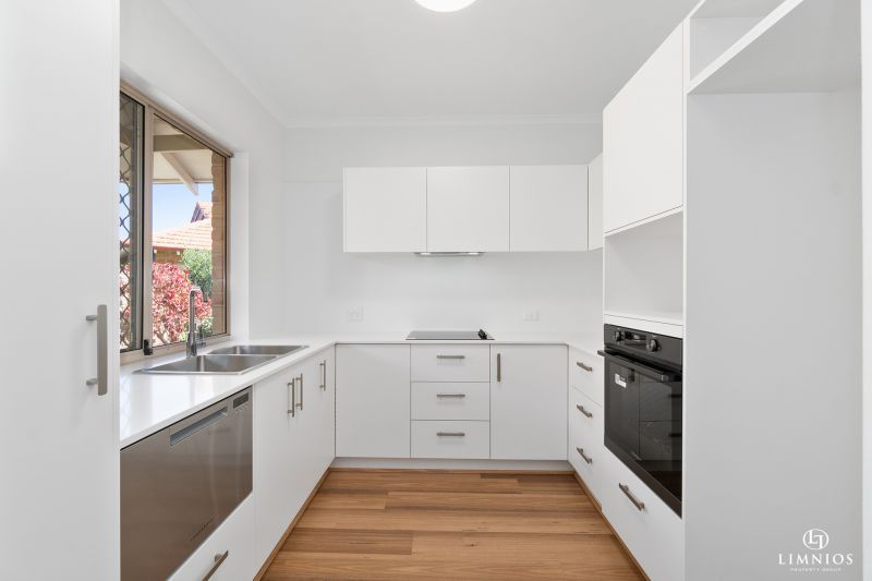 Light, bright 2 Bedroom Villa with Modern Upgrades in a Prime Location!