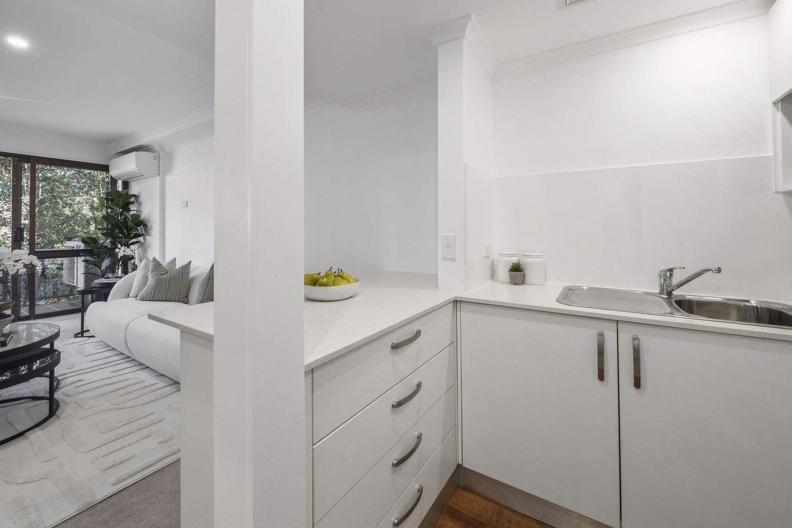 A serviced apartment surrounded by garden greenery