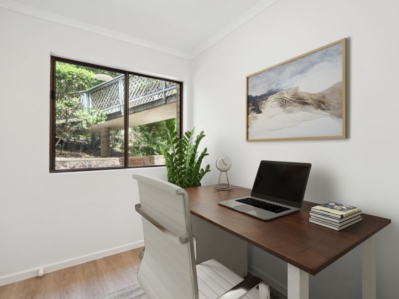 Charming one-bedroom plus study apartment surrounded by lush greenery