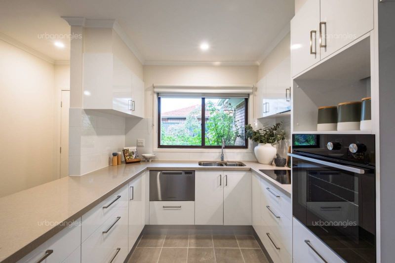Exclusive two-bedroom villa featuring a pristine backyard