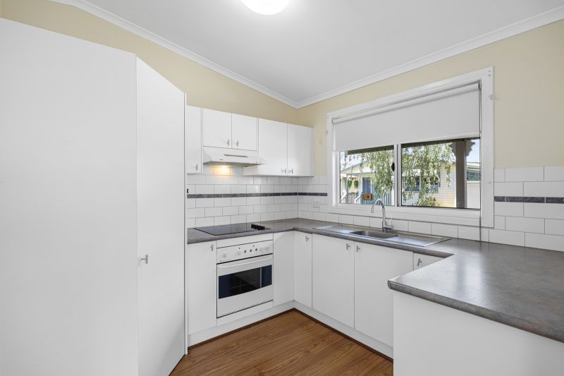 Corner Cottage with Spacious Backyard 
Affordable Lifestyle Opportunity