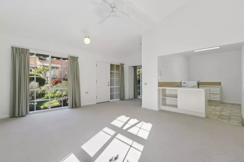 Village Heart Retreat with Vaulted Ceilings and Courtyard