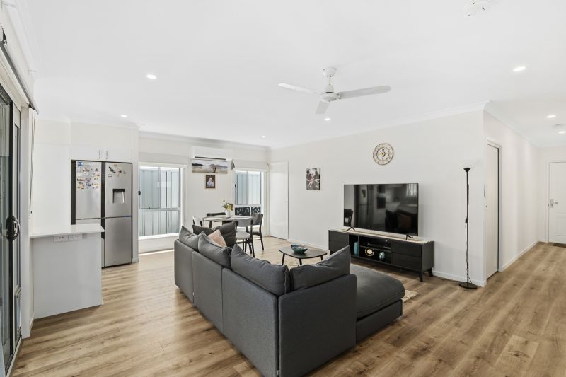 Elevated Home with Spacious Backyard and Modern Interior