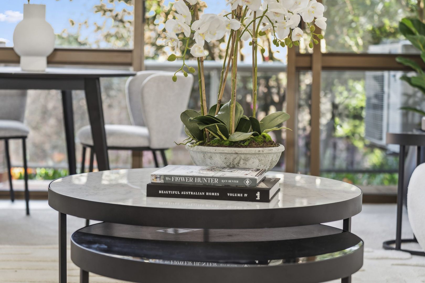 A serviced apartment surrounded by garden greenery