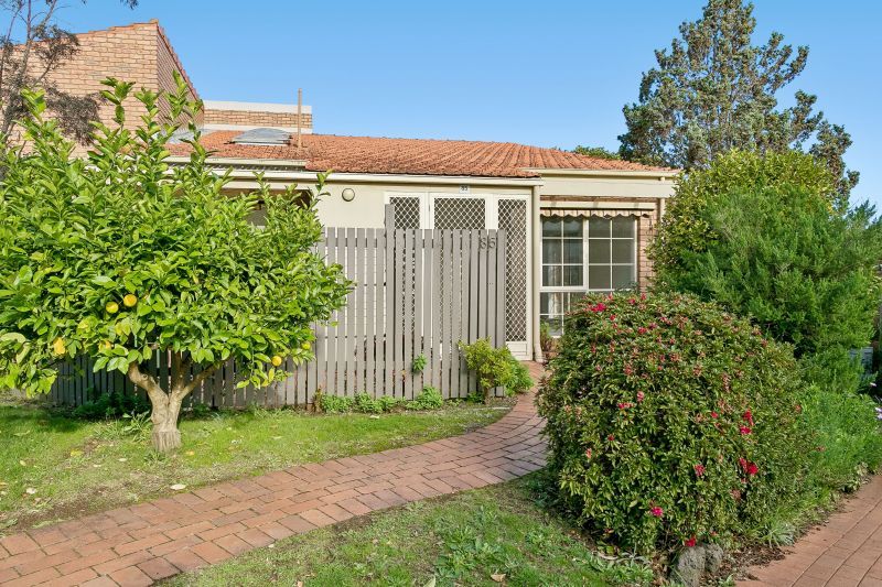 Elegantly Updated and Courtyard Charm