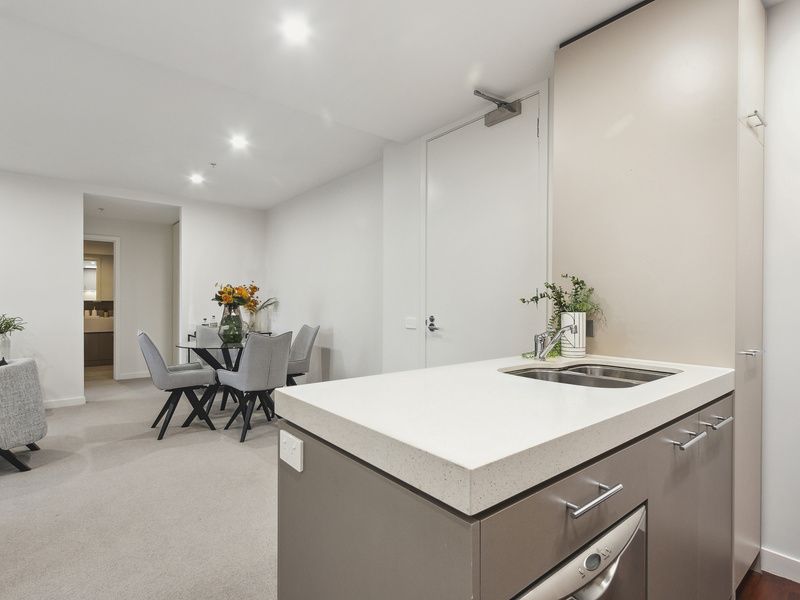 Modern, Light-Filled Apartment with Balcony and Secure Parking