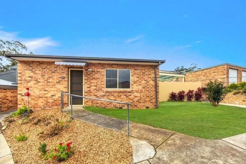 Modern, Spacious Living with Large Sunny Courtyard and Single Garage