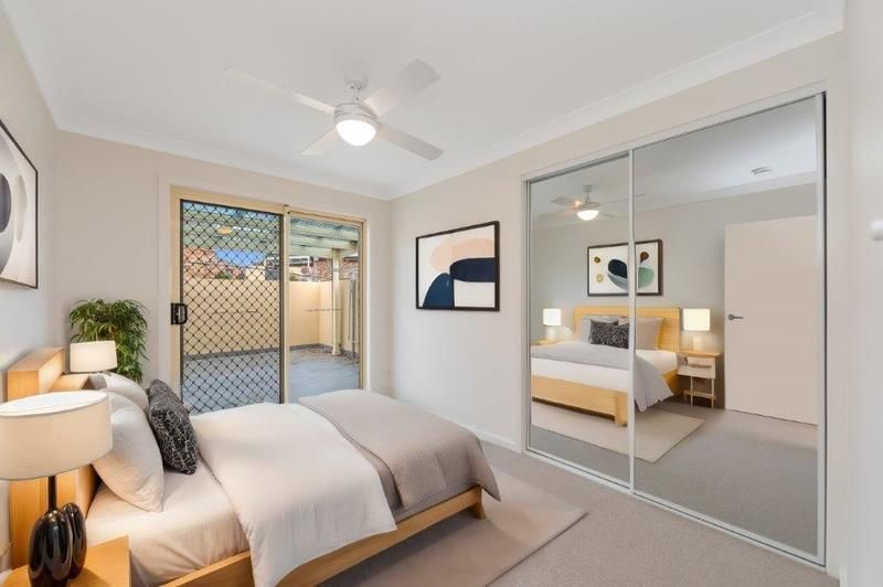 Modern, Spacious Living with Large Sunny Courtyard and Single Garage