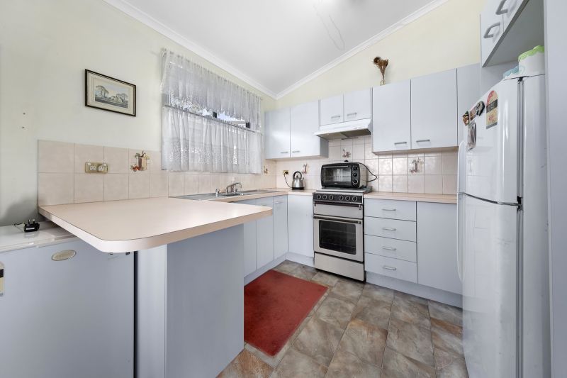 Charming Opportunity with Spacious Backyard