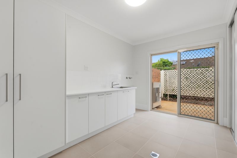 East facing enclose sunroom, perfect for the entertainer