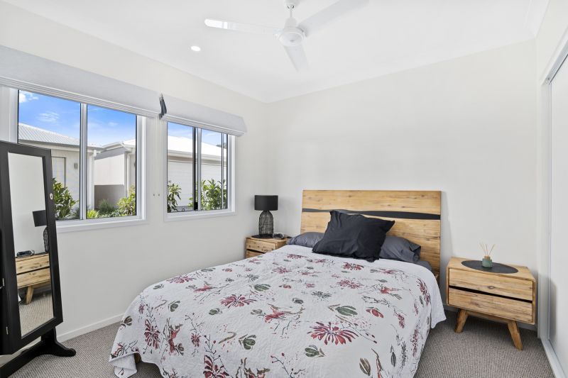 Elevated Home with Spacious Backyard and Modern Interior