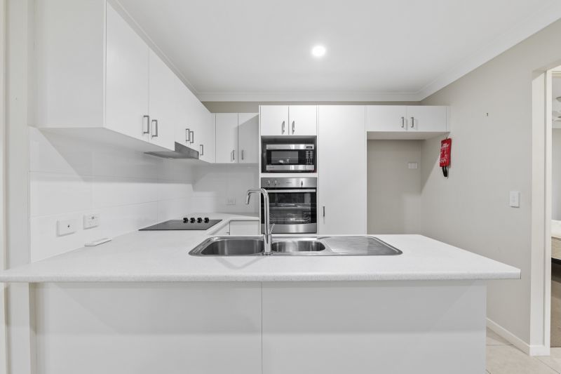 Lush Garden Views & Carefree Living!