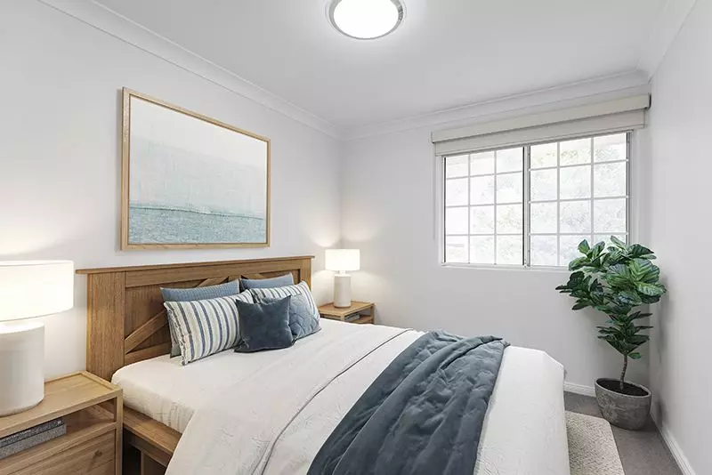 Exquisitely maintained and conveniently located sun-filled unit