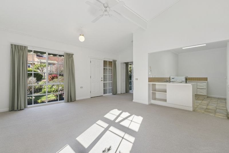 Village Heart Retreat with Vaulted Ceilings and Courtyard