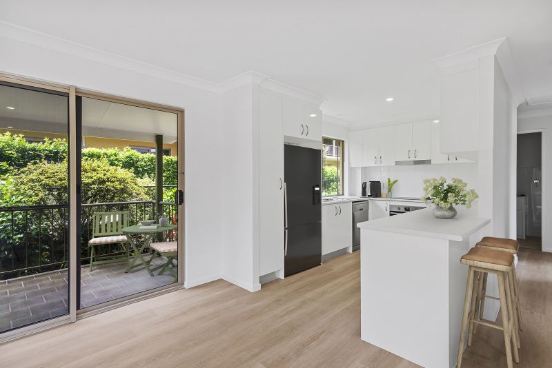 Elevated 2-bedroom villa surrounded by trees