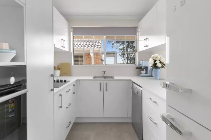 Newly renovated 3 bedroom unit with garden and district views