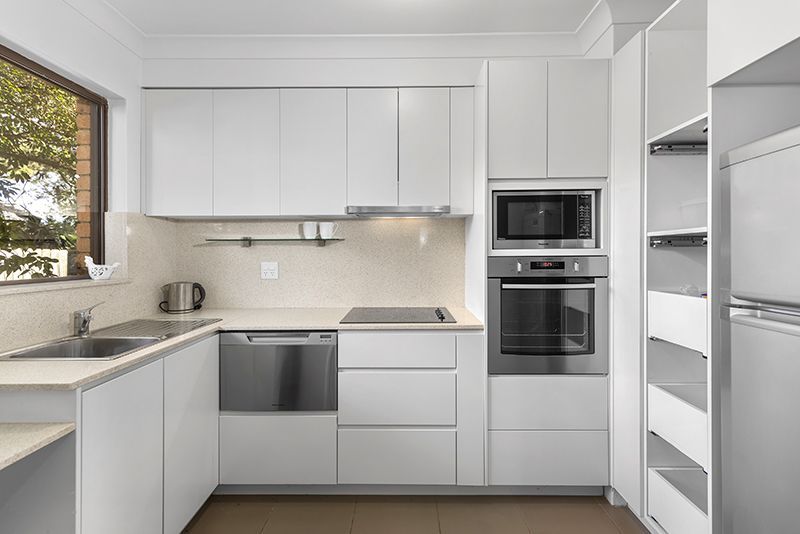 Beautifully presented two bedroom unit nestled in the centre of the village with large rear courtyard.