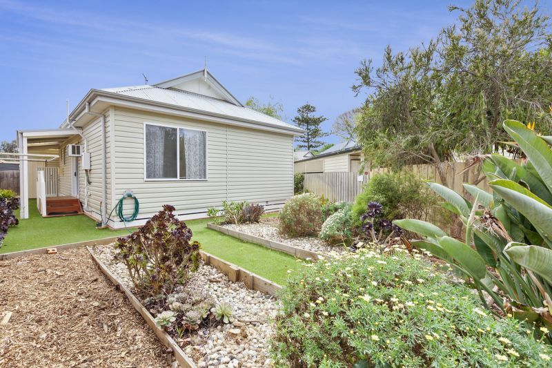 Charming Two-Bedroom Home with Beautiful Gardens