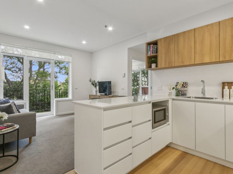 Stylish Retreat with Two Private Balconies and Modern Upgrades