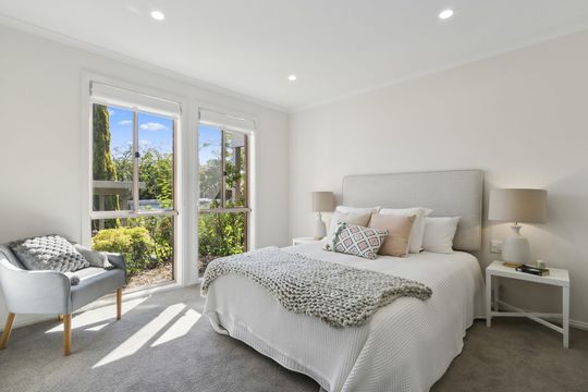 Exclusive three-bedroom villa featuring a pristine backyard
