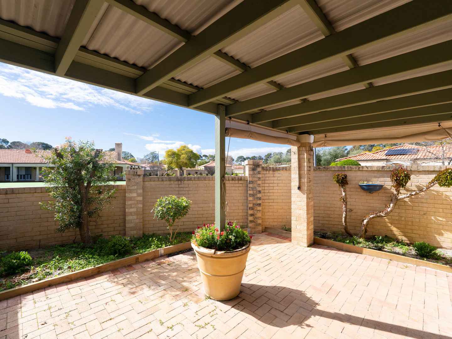 Renovated corner villa with bowling green views