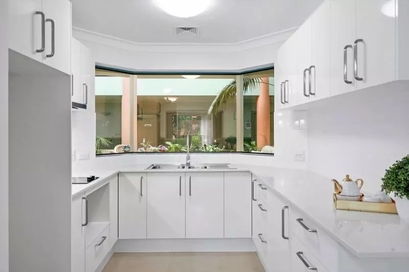 Ground floor apartment with enclosed balcony