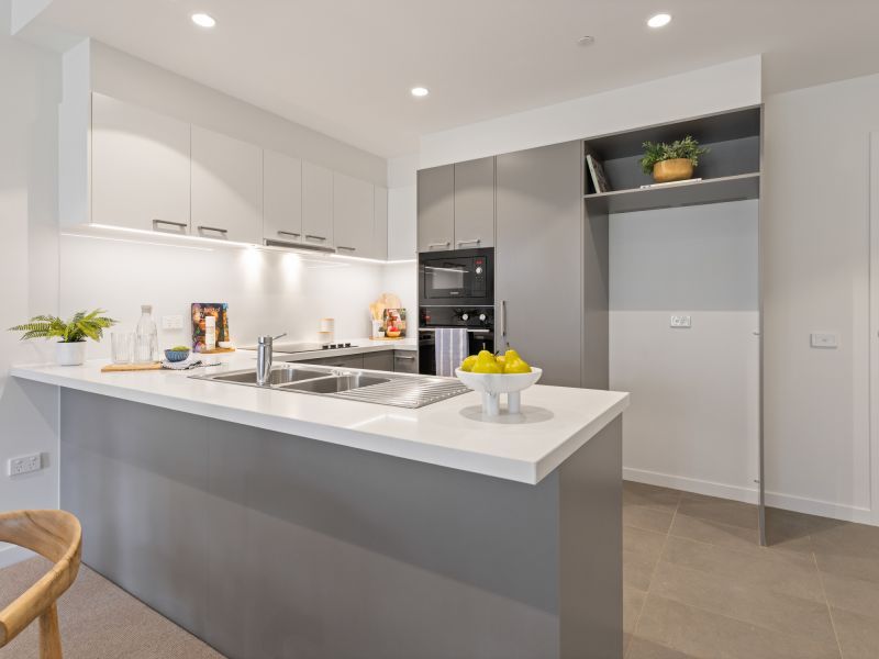 DEPOSIT TAKEN - Light-filled ground floor apartment with lagoon views!