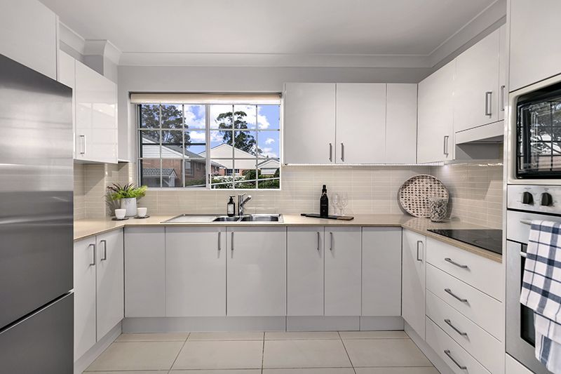 Exquisitely  renovated corner ground floor unit close to the clubhouse