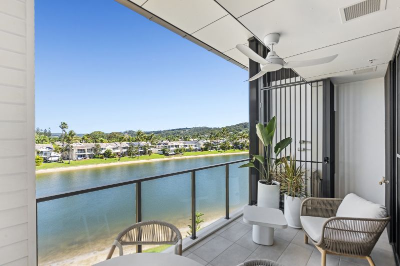 Top-Floor Waterfront Living