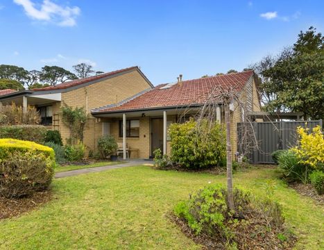 North-facing two-bedroom villa with private backyard