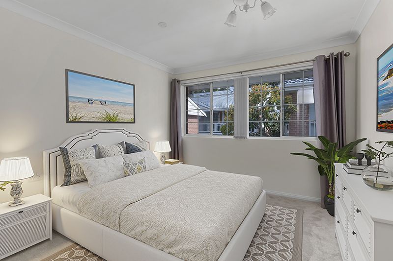 Immaculately presented upper level unit with leafy garden views