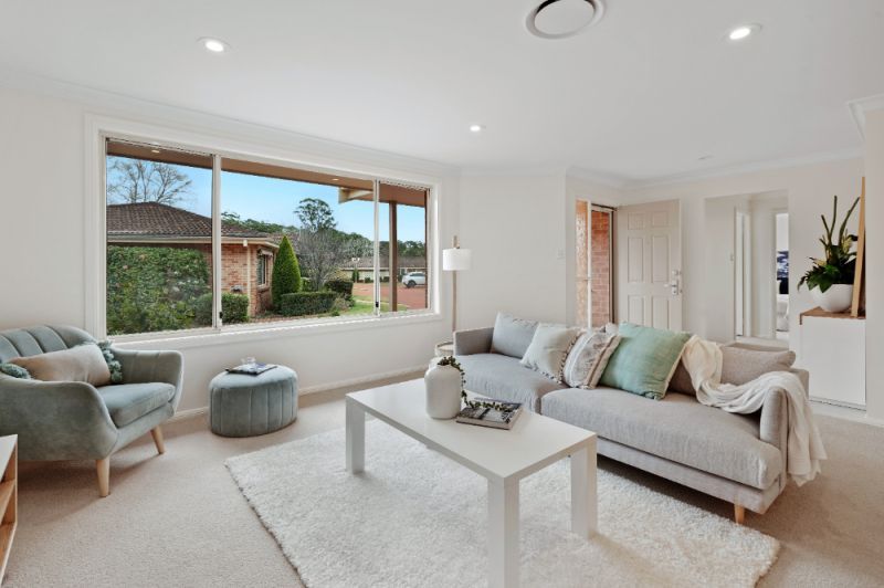 Sit back and relax on your sun drenched patio! Looking onto the parkland enjoying the lifestyle here at Tarragal Glen!