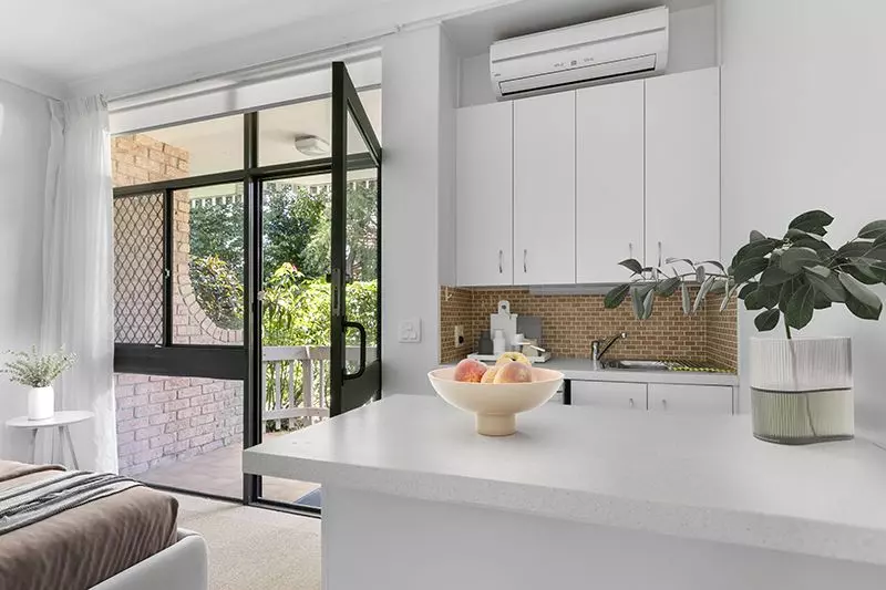 Easy living in this sun filled, ground floor garden apartment.