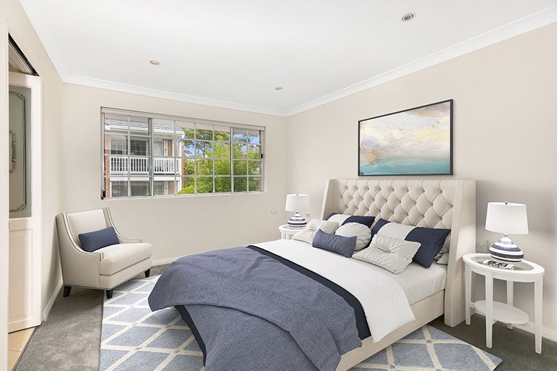 Perfectly located unit overlooking lush, green gardens.