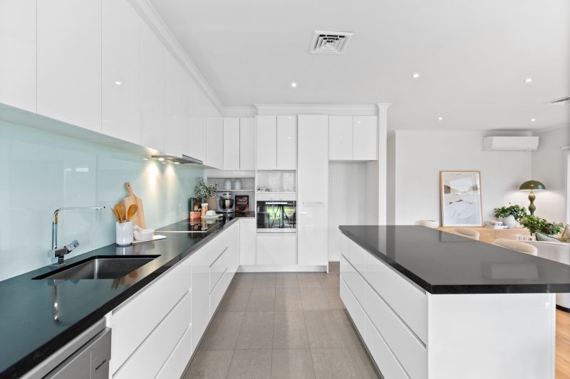 Stylishly updated two-bedroom plus study villa with delightful garden