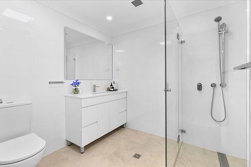 Beautifully renovated 2 bedroom unit with sunny balcony and light-filled throughout.