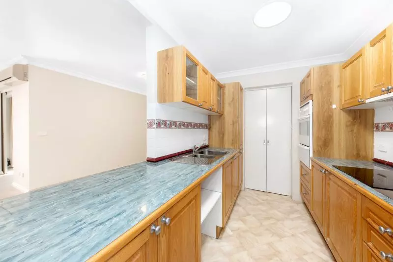 ELEVATED OVERLOOKING THE WELL MANICURED GARDENS