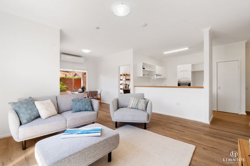 UNDER OFFER. Light-filled, Ground Floor Apartment with Wrap-Around Courtyard