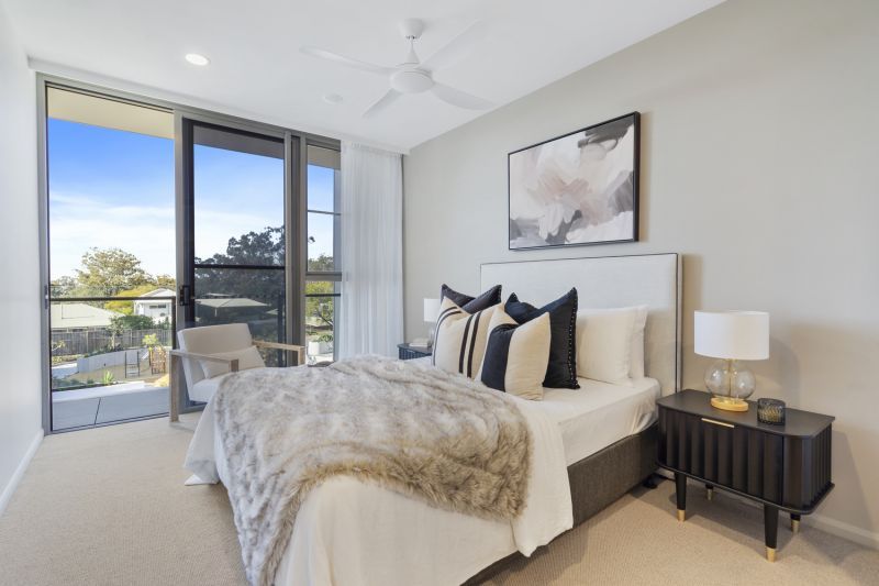 Stylish two-bedroom apartment with tranquil tree lined views