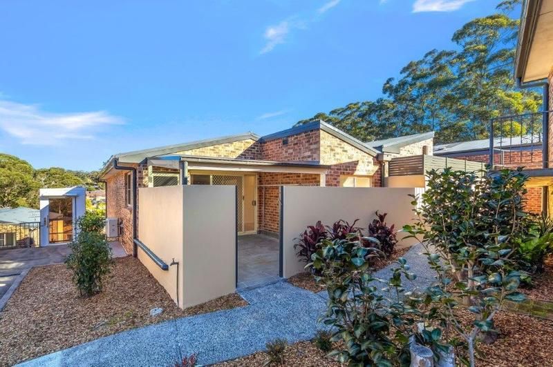 Modern Unit with Sunlit Courtyard, Water Views, and Stylish Upgrades