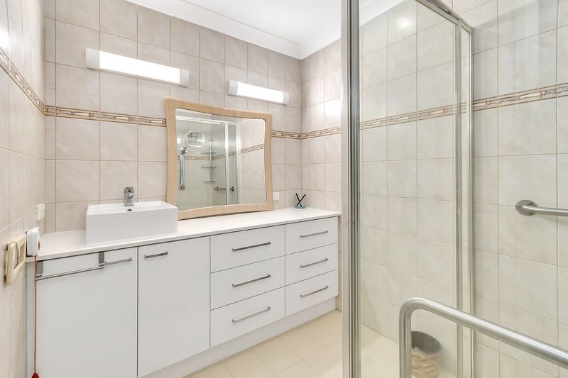 Sunny Yard and Vibrant Village Lifestyle