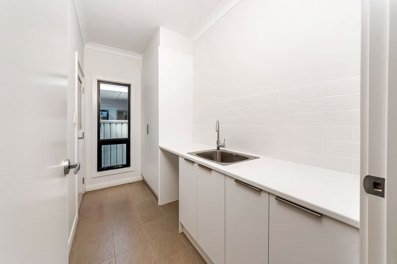 Spacious Design Inside and Out -  Large Rear Garden with Decked Entertaining Area.