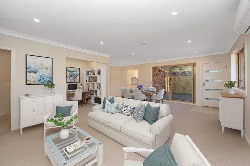 Modern Unit with Sunlit Courtyard, Water Views, and Stylish Upgrades