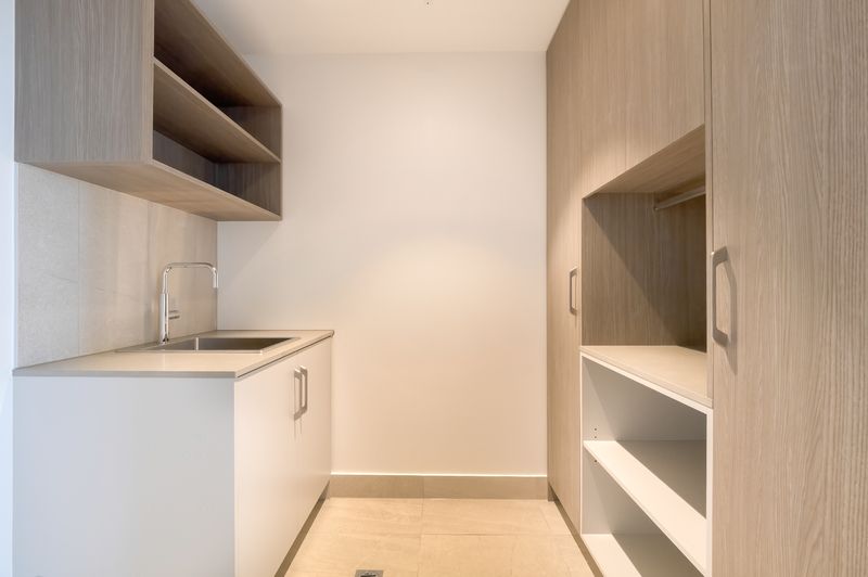 Urban Sophistication with Sweeping Balcony Views