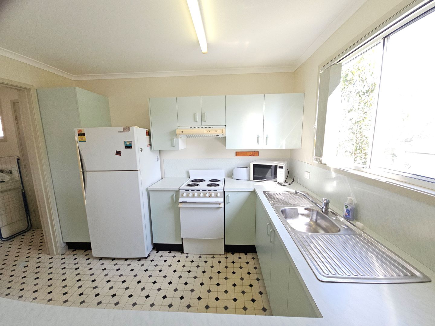 New listing: Discover Your Spacious Oasis: 2-Bedroom Home with Sunroom in a Prime Village Location