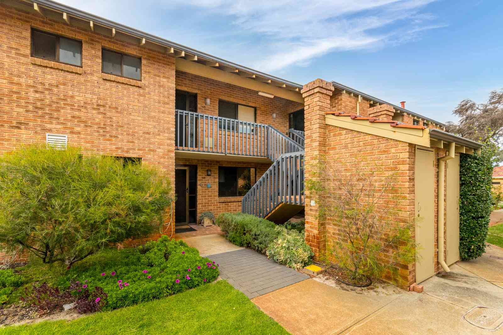 Freshly updated villa with garden views & sunny east-facing balcony