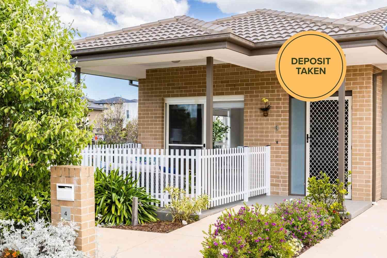 Discover easy living in this beautiful two-bedroom villa at Caddens Village