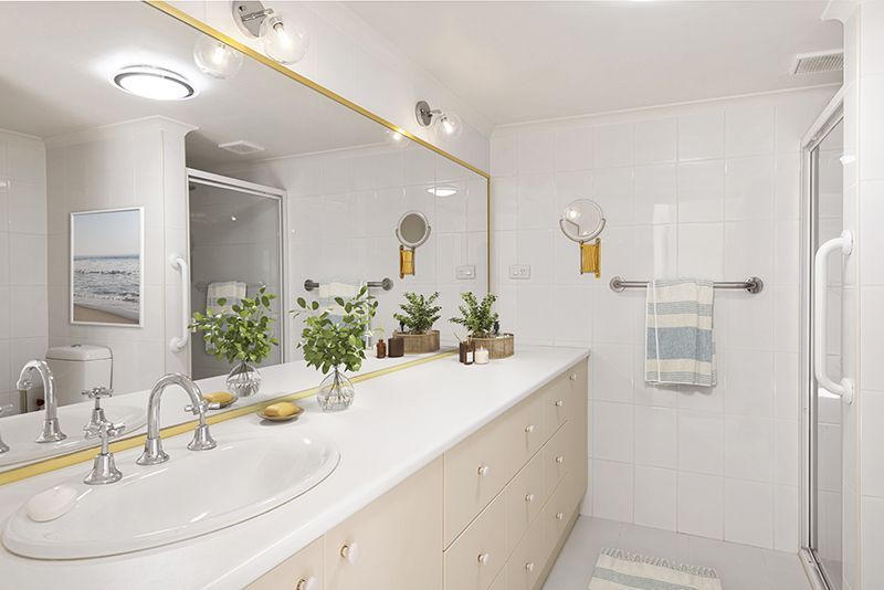 Centrally located, impeccably presented ground floor unit with large rear sunny garden courtyard.